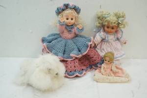 lot 289 image: Dolls In Home Made dresses