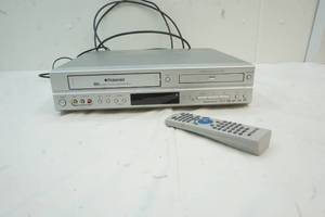 lot 311 image: polaroid  DVD , VHS player