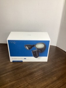 lot 27 image: New - Factory Sealed - Black Ring Floodlight Cam Wired Pro with 3D Motion Alert - Retail $249.99