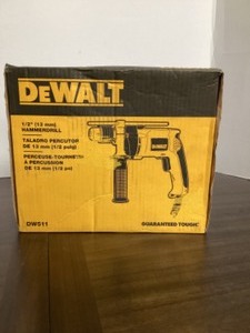 lot 37 image: DEWALT 7.8 Amp Corded 12 in. Variable Speed Reversible Hammer Drill ( used like new condition)