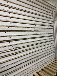 lot 4 image: Quantity 25 NEW DRICORE SMARTWALL 4 in. x 2 ft. x 8 ft. All-in-One Wall Panel R15.1 - Foam Insulated w Predrill Runs fire  water rated drywall- Retail $3624.75