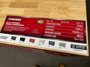 Husky 46 in. W x 24.5 in. D Standard Duty 9-Drawer Mobile Workbench Tool Chest with Solid Wood Top in Gloss Red - Unused Minor Dents