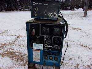 lot 8 image: Miller CP-200 Welder w Miller S-22A wire feeder. 3 phase. not tested by us for working condition