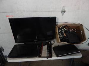 lot 31 image: samsung flat screen tv, dvd player, remotes, cords, more