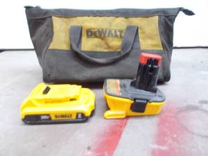 lot 85 image: dewalt 2ah 20v lithium ion battery and 20v max to 18v adapter