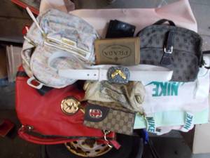 lot 126 image: Assorted purses, handbags, and wallets