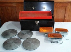 lot 340 image: Thunder Bird Hub Caps, Marker Lights and Toolbox.