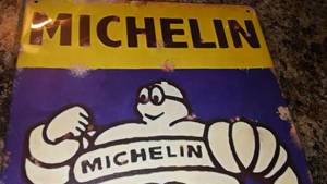 lot 231 image: Michelin Tyre Metal Sign 8 x12