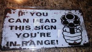 lot 233 image: Revolver Range Metal Sign 6 x12