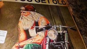 lot 235 image: Riding Getting Old Metal Sign 8 x12
