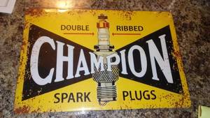 lot 259 image: Champion Spark Plugs Metal Sign, 8 x 12.