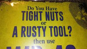lot 261 image: WD-40 Metal Sign, 8 x 12.