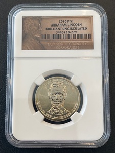 lot 63 image: 2010-P Lincoln Presidential Dollar NGC Brilliant Uncirculated