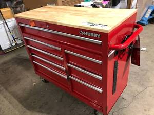 lot 1 image: Husky 42 in. W x 18.1 in. D 8-Drawer Red Mobile Workbench Cabinet with Solid Wood Top No Keys Damaged Customer Returns See Pictures