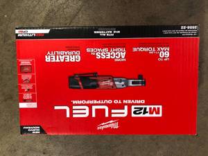lot 21 image: Milwaukee M12 FUEL 12V Lithium-Ion Brushless Cordless 12 in. Ratchet Kit W (2) 2.0Ah Batteries, Charger & Tool Bag  Customer Returns See Pictures