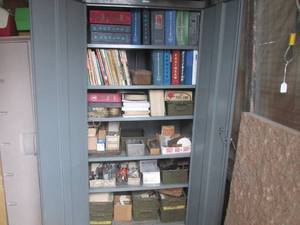 lot 1 image: (P) Large Metal Cabinet Containing Several Repair Manuals and Large Assortment of Misc - Cabinet included if you want it (Key included)