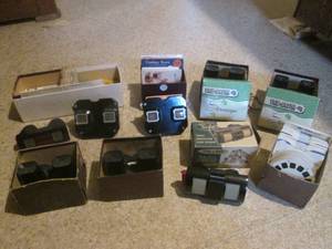 lot 11 image: (K) Assortment of 8 Vintage View-Masters with Assorted Reels