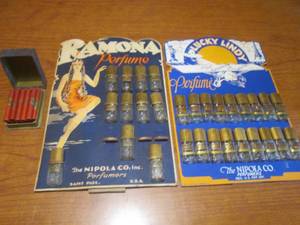 lot 61 image: (DLR) Vintage Perfume Countertop Displays with Bottles (Bottles Empty)