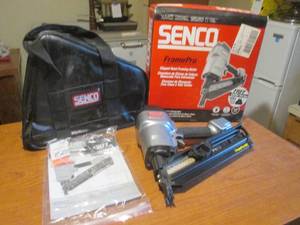 lot 64 image: (DLR) Senco FramePro Clipped Head Framing Nailer with Bag in Box - Includes Some Nails Not Pictured - Looks Very Lightly Used