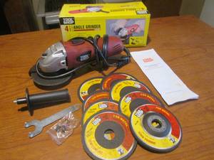 lot 71 image: (DLR) Tool Shop 4 12 Angle Grinder with Extra Grinding Wheels