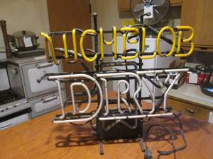 lot 81 image: (DLR) Michelob Dry Noen Light - Part of M Missing - Orange background and DRY faintly light up. See last photo.