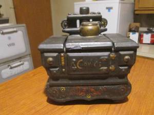 lot 90 image: (DLR) Vintage McCoy Old Stove Cookie Jar - Has a Repair  See Photos
