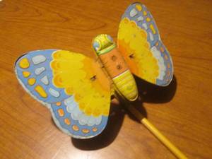 lot 114 image: (DLR) Vintage J. Chein Tin Butterfly Push Toy with Wood Handle Wings Flap When Pushed - Works