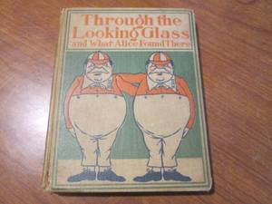 lot 126 image: (DLR) Antique Book Through the Looking Glass and What Alice Found There by Lewis Carroll Copyright 1897 by Henry Altemus Hard Cover