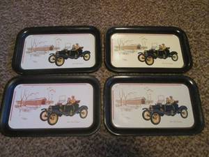 lot 228 image: (DLR) 4 Vintage Tin Trays with 1910 Ford Torpedo Bridge Scene 14 14 x 8 78