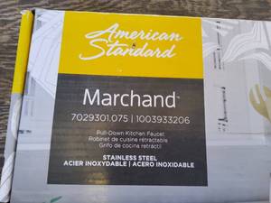 lot 57 image: American standard, Marchand pull down kitchen faucet set, New open box.