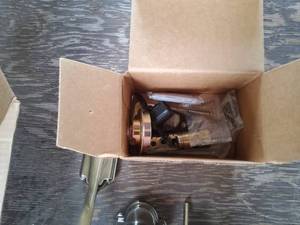 lot 134 image: Kwikset front door handle set, new