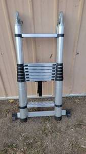 lot 144 image: Aluminum,Telescoping Ladder,Very versatile and used very little