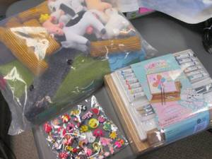 lot 35 image: Art Studio Easel with Acrylic paint and supplies,  Velcro Farm Animals and play mat, plus Croc  character decor