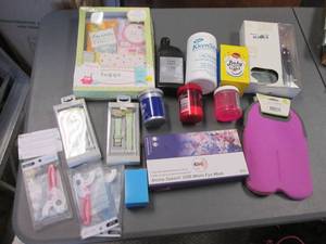 lot 39 image: Storage tote with assorted gift sets and other supplies