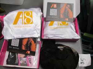lot 61 image: Pair of Real Hair Choose Us, Choose Beautiful Wigs