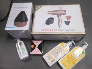 lot 65 image: PureSpa Natural Aromatherapy Diffuser,  Conair Infinity Pro Frizz-Free Pro Hair dryer and assorted personal care supplies with storage crate