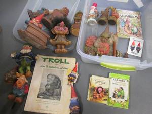lot 310 image: Interestingly Unique collection of Gnome and troll statues,  books, games and more (all nestled in a covered tote)