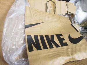 lot 314 image: Box with large number of heavy duty Nike shopping bags