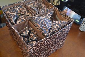 lot 117 image: Leopard Print Organizer Bin  Matching Set of Makeup Organizer Bags