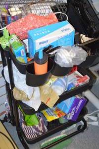 lot 193 image: Assorted Rack with Cleaning & Household Supplies