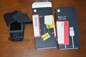 lot 202 image: Apple iPod Shuffle Touch Screen with Fitness Strap and two old Apple Charging Cables