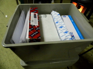 lot 36 image: Lidded file box Tote Full of assorted Office Supplies and accessories