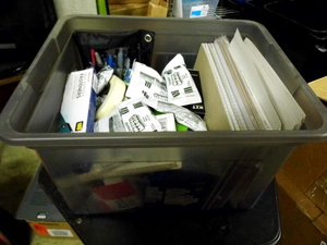 lot 43 image: Lidded file box Tote Full of assorted Office Supplies and accessories