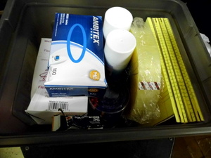 lot 46 image: Covered file box Tote Full of assorted Office Supplies and accessories