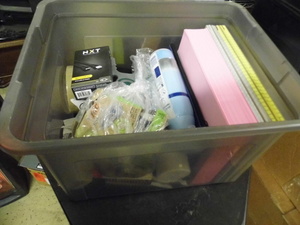 lot 47 image: Lidded file box Tote Full of assorted Office Supplies and accessories