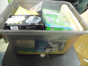 lot 49 image: Lidded file box Tote Full of assorted Office Supplies and accessories