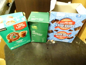 lot 102 image: New box of Donut Shop k-cups,  Open box Swiss Miss Hot Chocolate and stir sticks
