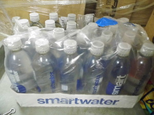 lot 105 image: Broken case originally 24pk of Smart Water