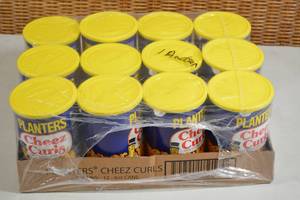 lot 64 image: Flat of Planters Cheese Curls Snacks - 12 4oz Cans