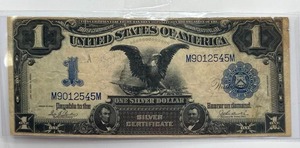 lot 31 image: 1899 $1 Black Eagle Bill (amazing shape for 125 year old bill)